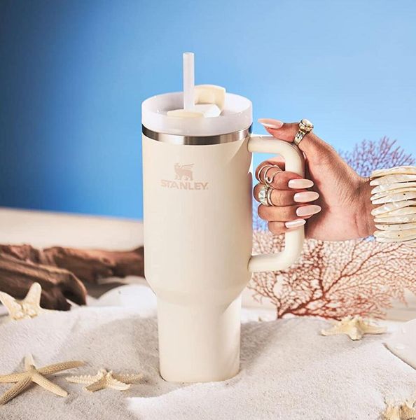 

rose quartz stanley with logo quencher h2.0 40oz tumblers cups handle insulated car mugs frosted lids straws stainless steel coffee termos r