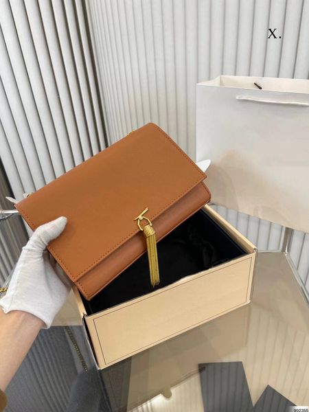 

2023 new designer style cowhide storage bag classic solid color advanced minimalist wind sue chain ladies crossbody bag