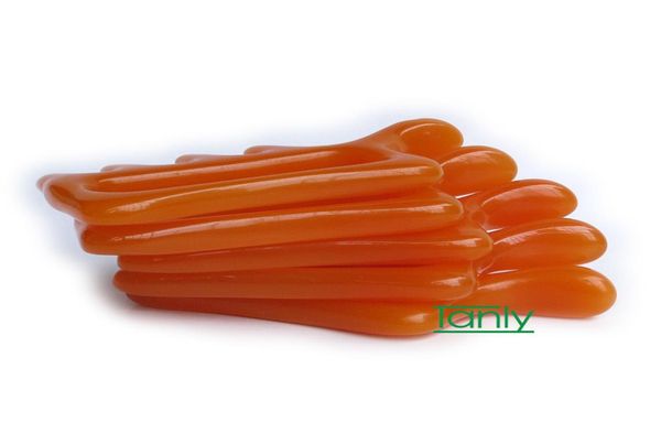 

100pieceslot whole retail traditional acupuncture massage tools yellow animal shape resin beauty kit2590876