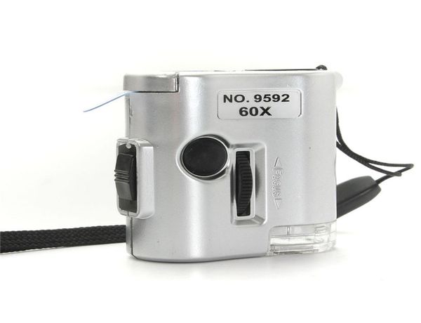 

mini 60x microscope illuminated magnifier glass jeweler loupe lens with led uv light watch repair tool2357710