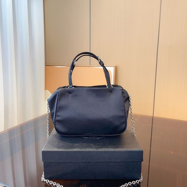 

flou series nylon strong fabric women's handbag design sense of all-matching age reduction small simple and generous