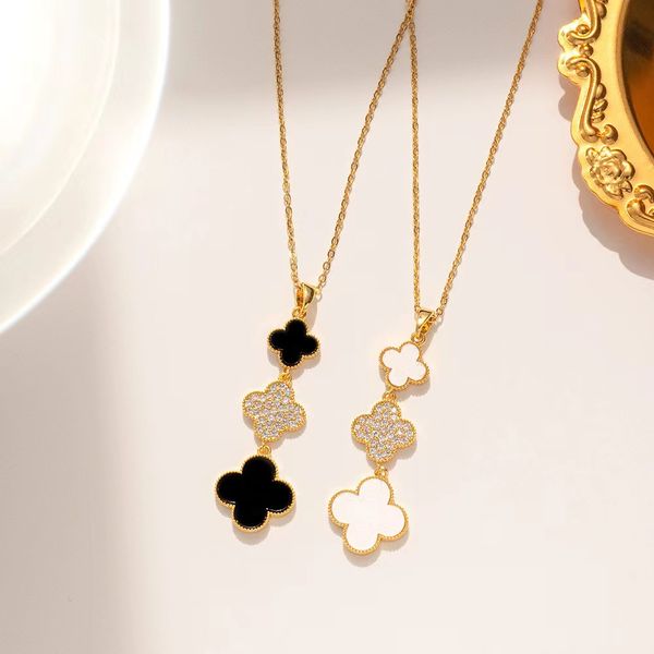 

Designer jewelry black and white four-leaf Clover Necklace female clavicle chain light luxury pendant fashion 18k Gold necklace Classic girls for gifts