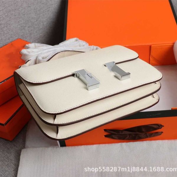 

designer h home bag 2023 spring summer new hand pattern silver buckle tofu bag cross one shoulder crossbody high sense flight attendant kang