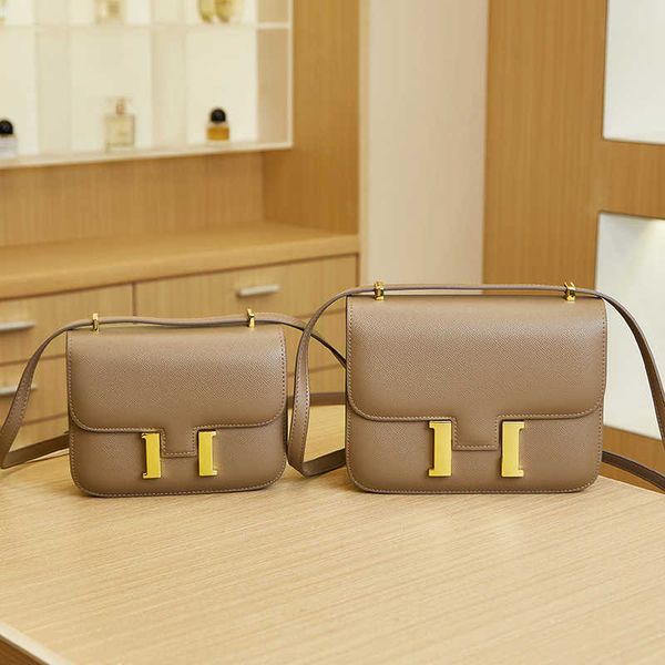 

designer h home bag flight attendant bag female 2023 new summer luxury button kangkang single shoulder crossbody box tofu