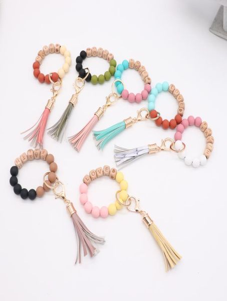 

whole foreign trade food grade silicone beads wrist keychain alloy cap pu leather tassel keychain female multicolor optional9798540, Silver