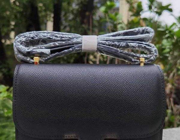 

designer h home bag new h 2023 family buttoned palm cow leather 23cm kangkang lady stewardess classic messenger 1 0534