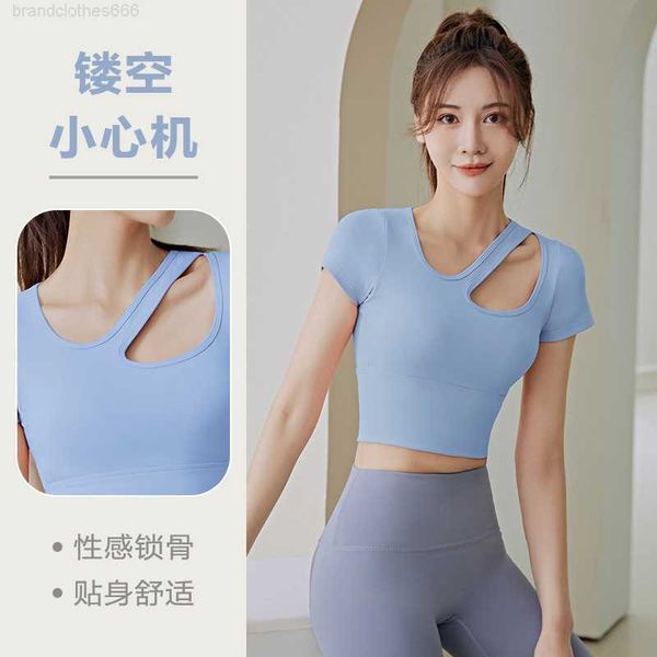 

quick drying breathable sports women's hollow out thin yoga women's high-strength shockproof yoga short sleeve with chest cushion