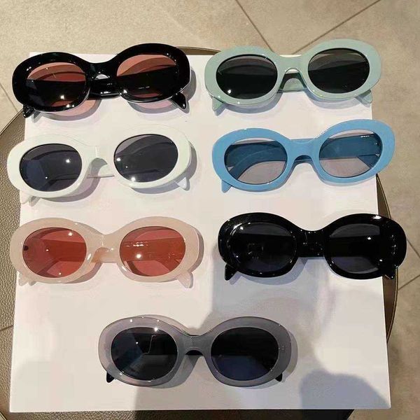 

new triumphal arch net red white oval women's men's sunglasses, White;black