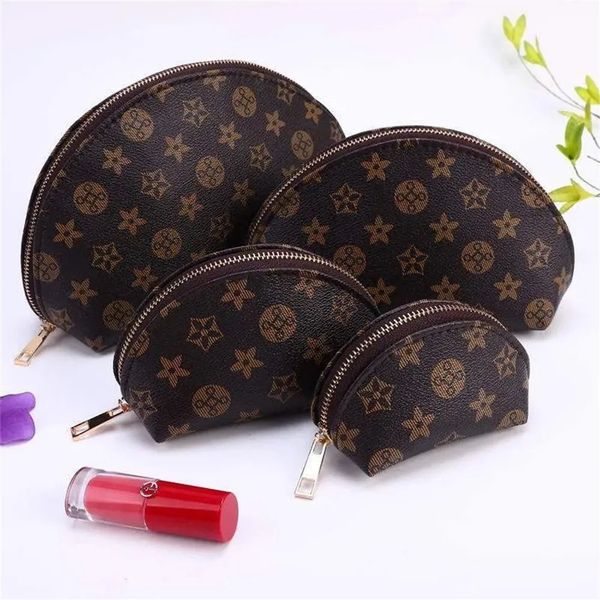 

2022 women cosmetic bags organizer famous makeup bag travel pouch make up bag ladies cluch purses organizador toiletry bag 4pcs set