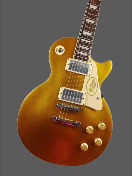 

gold electric guitar with mahogany body, rose wood fingerboard, express transport, stock456