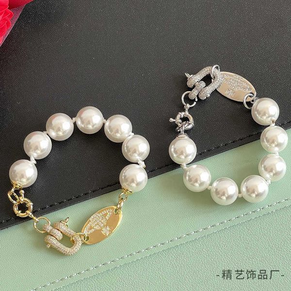 

2023 new western empress dowager vivian korean style pearl bracelet female brass handwear high edition, Golden;silver