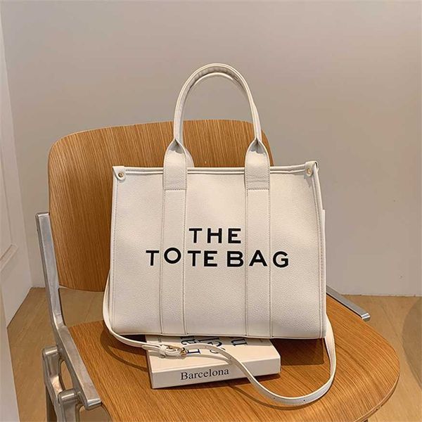 

texture tote bag 2023 summer new handbag large capacity shoulder bag simplified letter crossbody bag for women 80% clearance sale