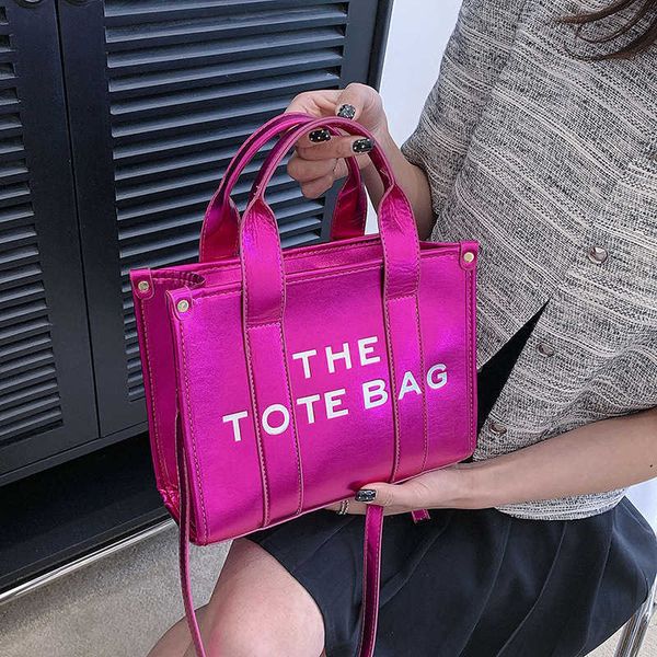 

japan and south korea trend handheld tote bag women's 2023 new pearlescent bright face indentation letter single shoulder crossbody bag