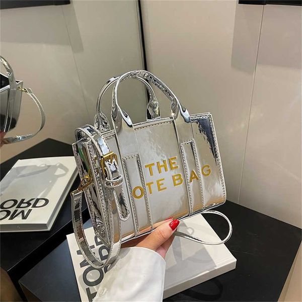 

2023 new lacquer printed letter handheld tote bag small and high end fashion crossbody bag 75% outlet wholesale