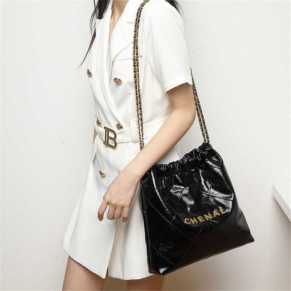

garbage bag autumn and winter new real cowhide chain bag personalized letter water bucket bag light luxury women's bag 60% factory outl