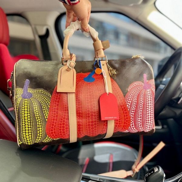 

designer bags totes letter co-branding pumpkin travel bag luxury brand duffel bags handbags men and women large capacity fitness yoga bag tr