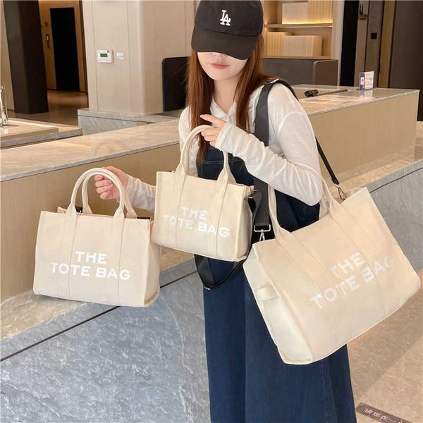 

the totebag women's letter handheld one shoulder crossbody bag 230612
