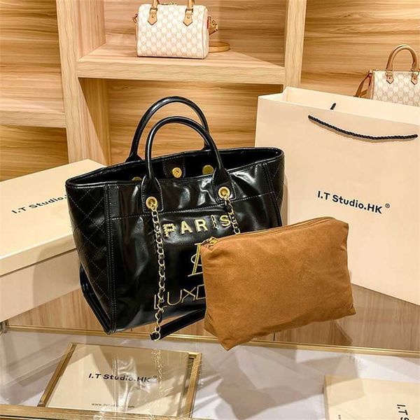 

genuine leather handheld women's bag soft leather tote bag women's large capacity commuter chain bag new women's bag 80% clea