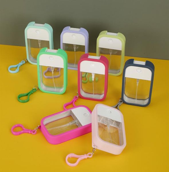 

classic design keychain colorful silicone portable hand sanitizer perfume bottle key chain bag pendant key ring4676885, Silver