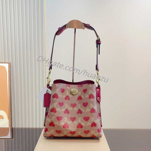

summer 2023 women's bag classic vintage love print bucket bag shoulder bag with large capacity crossbody design, versatile brown and re
