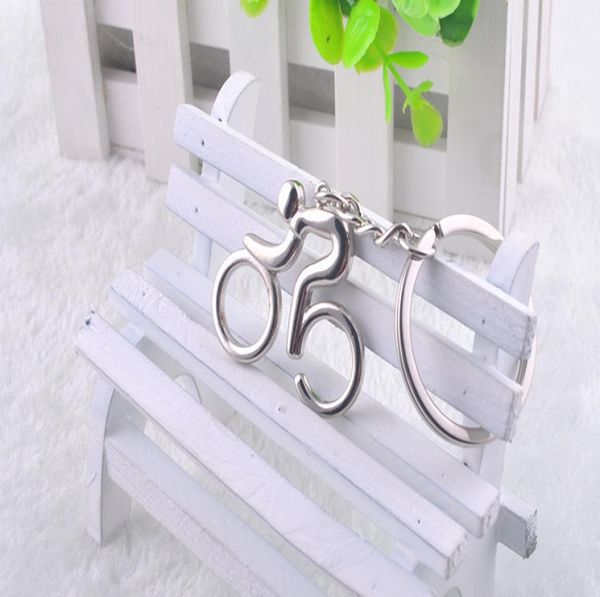 

whole zinc alloy man riding bicycle keyring metal novelty sport pendant keychain4127047, Silver
