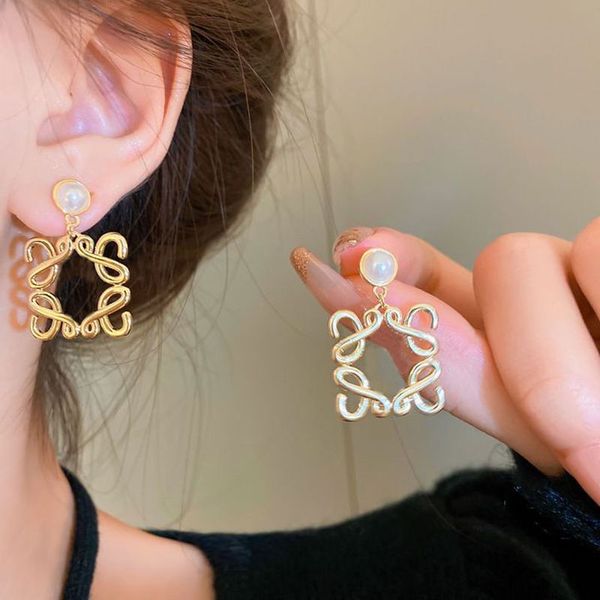 

designer pearl earrings ladies stud earrings luxury gold jewellery classic high end floral decoration, Golden;silver