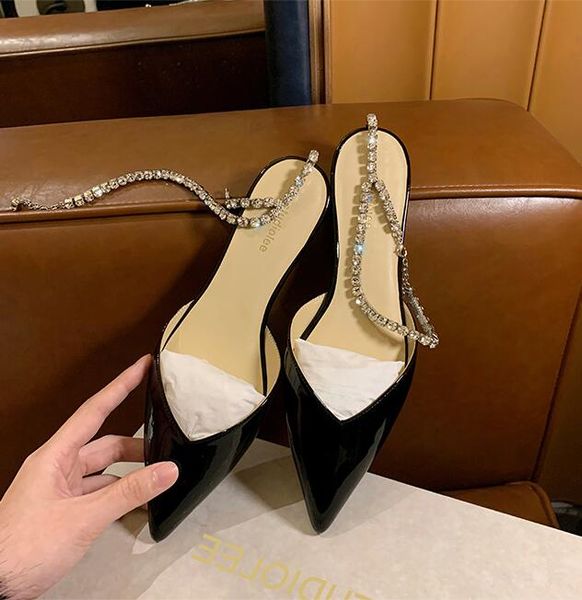 

shoes flat base sandals pointed chain empty word shoes baotou summer sandals black white sandals 35-40
