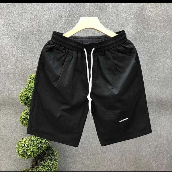 

summer new trendy high street ruffian shuai quick dried beach pants shorts solid men's sports shorts, White;black