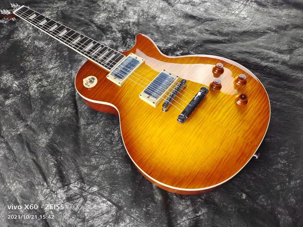 

mahogany electric guitar with honey tiger pattern, off the shelf, fast 56
