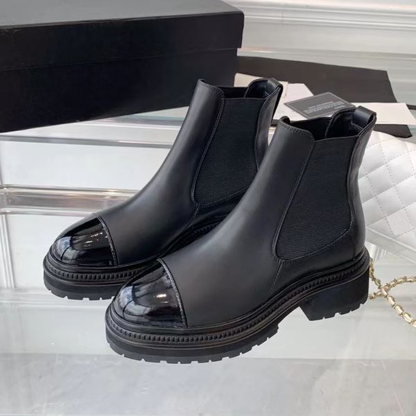 

fall/winter interlocking mixed black calfskin platform ankle boots flat leather chelsea boot round toe slip-on booties luxury designer shoes