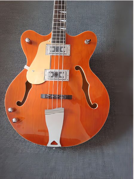

4-string 335 electric guitar, bass around