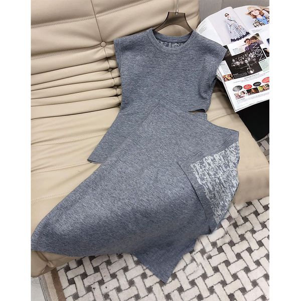 

2023 luxury brand design knitted multi-color skirts two piece set women o-neck sleeveless hollow out tank stitching long skirts ladies suit, White
