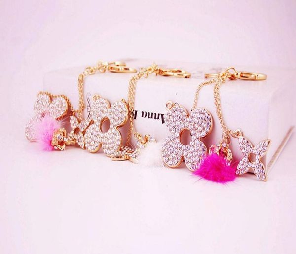 

diamond hair ball fourleaf clover car metal keychain ladies bag accessories key chain lovers metal pendant gift5135674, Silver