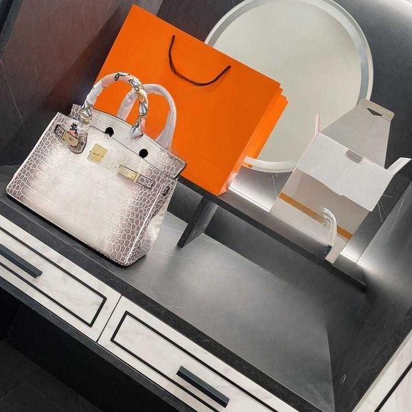 

suitcase and bag dinner nanfeng xiaopu wealth treasure qianjin kelly bag 2023 new handheld small women's advanced one shoulder crossbod