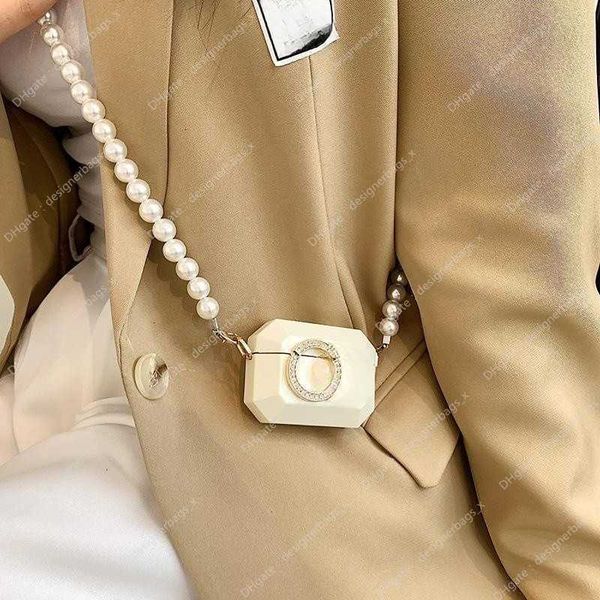 

luxury designer bag wallets designers women chain netizen same earphone pearl bags 2023 mini new fashion crossbody c versatile luxurys handb
