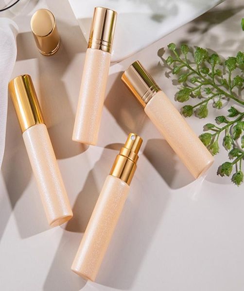 

20pcslot 10ml empty perfume spray glass bottle gold pearlised film roller on essential oil bottles4314853