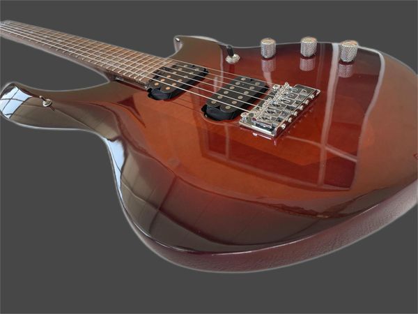 

high-end custom ernie ball music man electric guitar finished in red