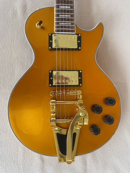

custom lp electric guitar gold body, gold hardware, black knobs
