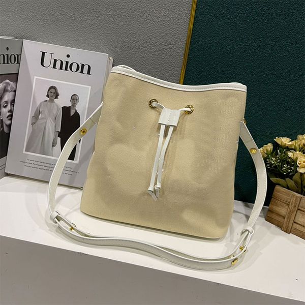 

cotton bucket bag shoulder bags embroidered letters floral genuine leather trim handbags zipped central flat pocket drawtring closure beach