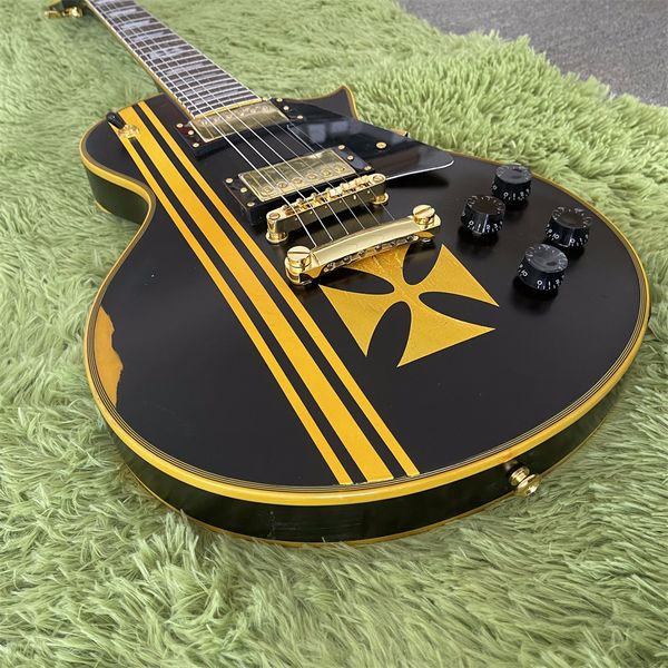 

yellow and black lp guitar of fast rosewood neck and fretboard
