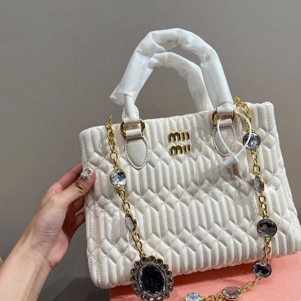 

designer bags miu new wrinkled miao handbag with high appearance value light luxury french internet red temperament large capacity and high