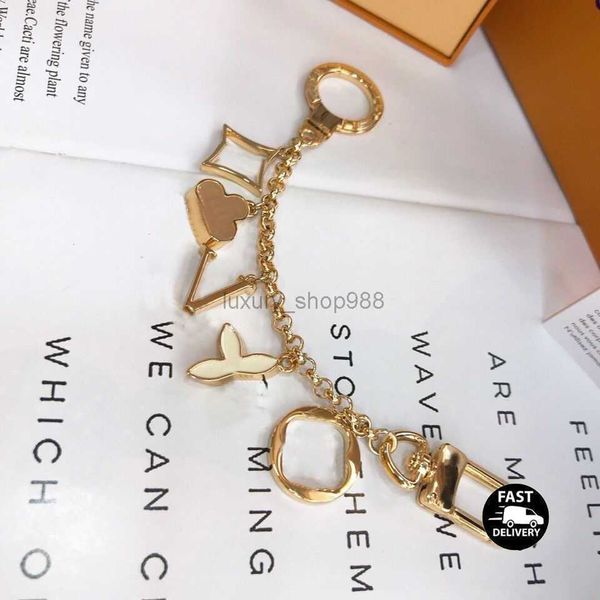 

luxury designer keychain fashion classic brand key buckle flower letter key chain handmade gold keychains mens womens bag pendant, Silver