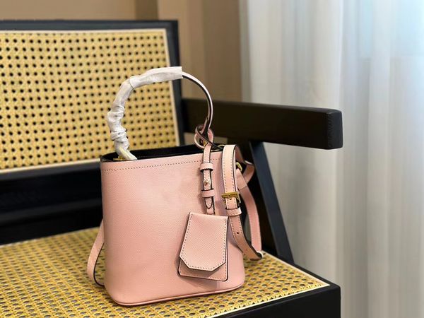 

summer leather explosive bucket bag solid color designer large capacity crossbody bag classic triangle logo black leather red background