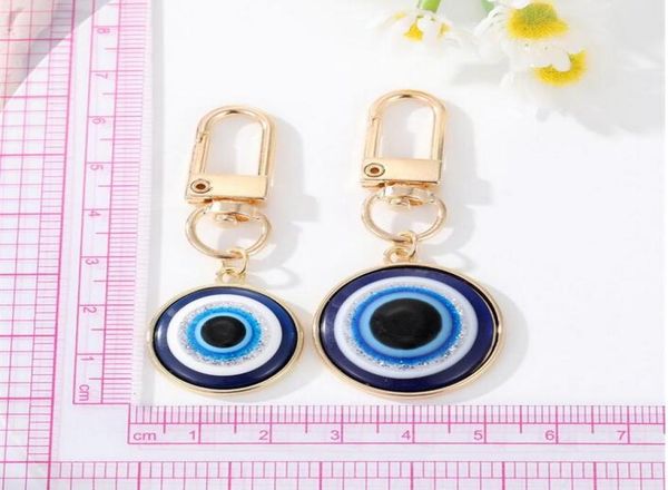 

turkish blue eye pendant keychain key ring for men women couple freind gift evil eye bag car accessories whole6354765, Slivery;golden