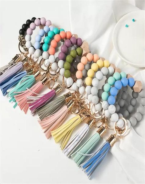 

14 colors wooden tassel bead string bracelet key chain food grade silicone beads bracelets women girl key ring wrist strap3397680, Silver