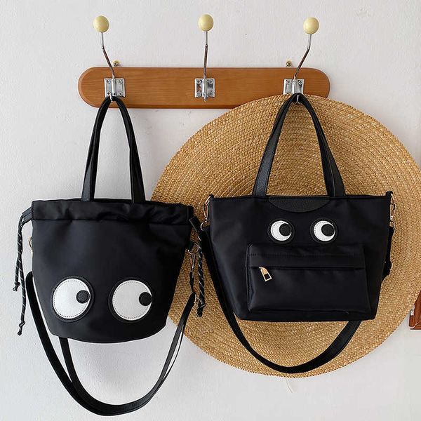

new spring/summer leisure mommy bag big eyes funny bucket nylon fabric bag cute tote shoulder bag