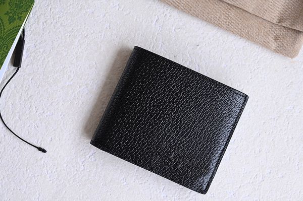 

this 2013 double fold wallet features a black leather wallet with gold accents. inside, there are 8 card compartments and 2 bill compartment, Red;black