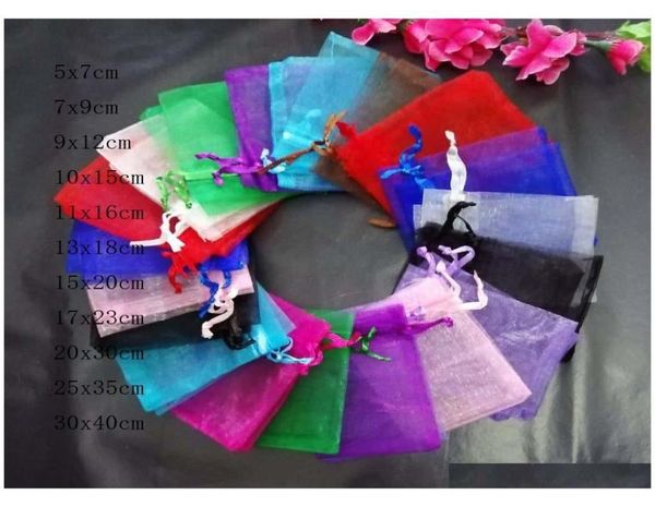 

whole 200pcslot 5x7 7x9 9x12 10x15 cm clear drawstring organza bags jewelry christmasweddingbirthdaygift packing bags xjf1260306, Slivery;golden