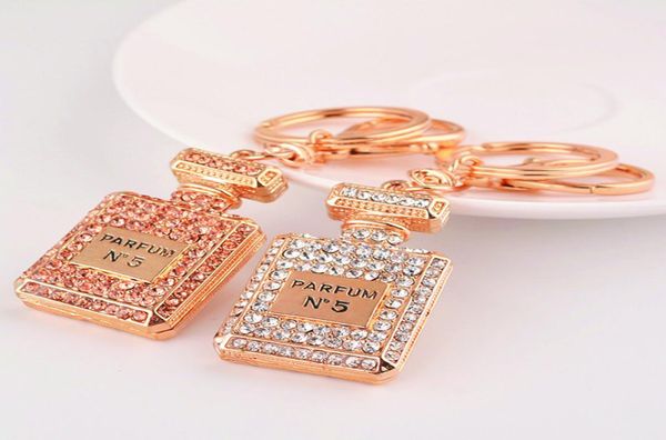 

novelty items full rhinestone perfume bottle design keychains crystal keyrings creative jewelry trinket for women 6711535, Slivery;golden