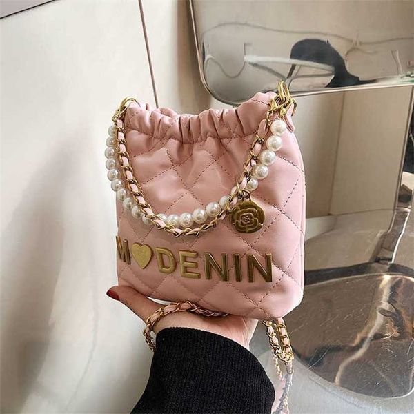 

designer bag 2023 handbag spring/summer new mini garbage for children's parent-child phone cross carrying pearl wrist